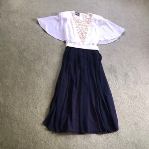 Angel sleeve dress by Designer Ursula of Switzerland